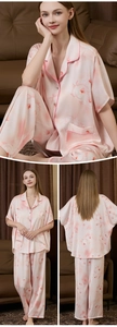 Detailed view of pink floral silk satin pajama set with short sleeves and long pants