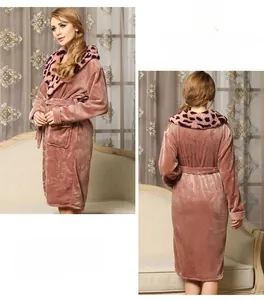 Detailed view of women's plush flannel bathrobe with leopard print hood and belt