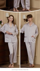 Detailed close-up of champagne silk pajamas with classic collar and contrast piping