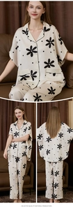 Close-up of silk pajamas set featuring sunflower print and high-quality piping details