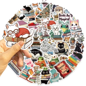Close-up of cute animal reading stickers on hands with waterproof cartoon pet designs