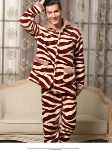 Detail of thick animal print coral fleece pajama set with soft flannel texture for men