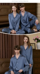 Detail of grey blue silk satin pajamas featuring classic lapel and smooth texture
