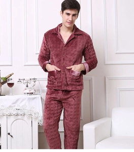 Detail of men's thick flannel pajama top with classic lapels and embossed plaid texture