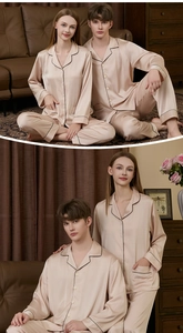Detailed view of champagne silk pajamas with black piping and classic lapel collar