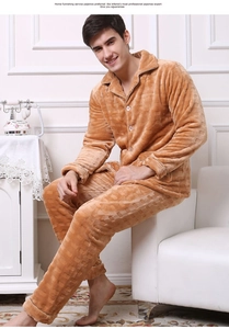 Detail of men's thick flannel pajama set showing plush checkered texture and soft fabric