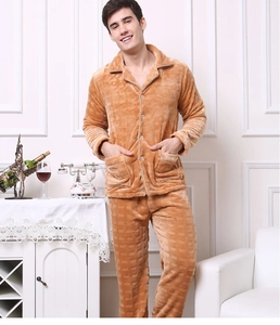 Detail of men's thick flannel pajamas with check pattern and classic notch lapel collar