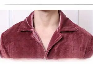 Detail of burgundy flannel pajamas featuring a sophisticated collar and square grid texture