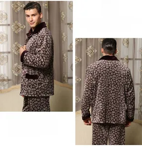 Detail view of stone grey coral fleece pajamas with mosaic pattern and button closure