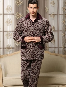 Close-up of thick flannel men's pajamas with grey pebble print and burgundy trim details