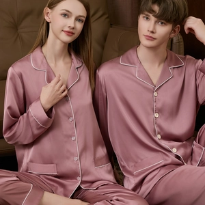 Classic pink silk satin pajama set for couples featuring long sleeves and contrast piping
