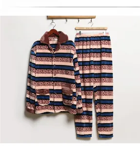 Detail of men's flannel pajama set featuring blue and pink leopard stripes and soft lapels