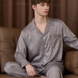 Men's silk pajamas set with geometric pixel pattern featuring long sleeves and trousers