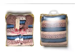 Front and back view of men's flannel pajama set in transparent brand packaging