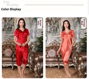 Détail des ensembles de pyjama en satin à col en V en rouge foncé et rouge orangé