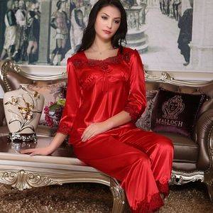 Luxurious red satin long-sleeve pajama set for women with elegant lace trim details