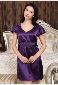 Detail of dark purple silk nightdress featuring a V-neck and delicate lace trim on sleeves