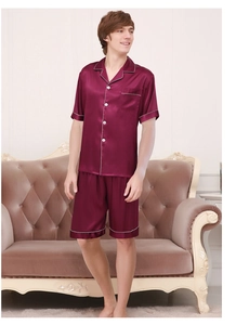 Detail of men's wine red silk pajamas set with short sleeves and white piping trim