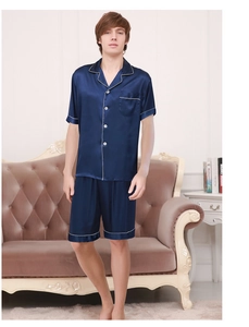 Men's navy blue silk-like pajama set with short sleeves and white piping details