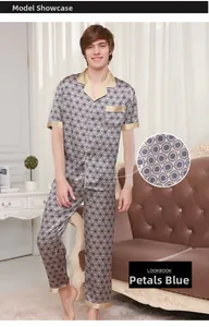 Close-up of men silk pajamas with geometric petal print and golden piped edges