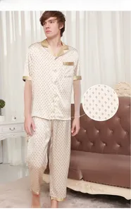Silk pajamas for men featuring champagne gold geometric patterns and satin trim details