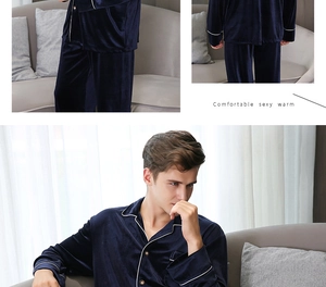 Detail of navy blue velvet men's pajamas set with elegant white piping in a cozy setting