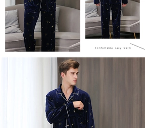 Detail of navy velvet men's pajamas with golden star pattern and soft white piping