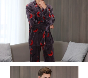 Detail of purple velvet pajamas featuring red moon patterns and white contrast piping trims