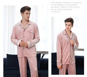 Close-up of pink velvet men's pajamas set with black piping and button details