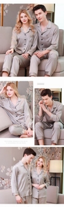 Detail of champagne gold satin pajamas set featuring chest pocket and elegant embroidery