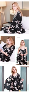 Three-piece black silk satin pajama set with pink floral print robe and pants