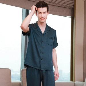Men's dark green silk satin pajama set with short sleeve button-up shirt and long pants