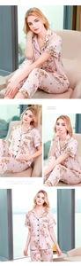 Detail of floral printed satin pajama set showing short sleeve lapel and smooth texture