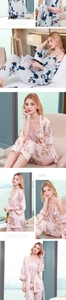 Detailed view of women's 3-piece silk pajama set featuring floral print robe and pants