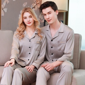 Matching couple silk pajamas in champagne with long sleeves and Harmony embroidery