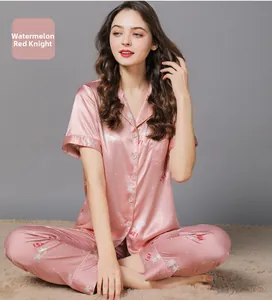 Women silk pajamas set featuring unicorn print short sleeve top and matching pants