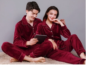 Detail of burgundy waffle knit pajamas with contrast piping on collar and sleeves