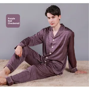 Close-up of men's silk pajama set in purple grid with classic lapel and piping detail