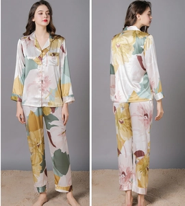 Floral print satin pajama set featuring long sleeves and lapel collar in a silky finish