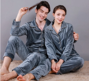 Close-up of charcoal gray waffle weave couple pajamas showing plush texture and buttons