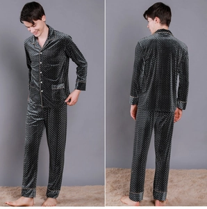 Detail of dark grey velvet pajamas with diamond quilted texture and contrast piping