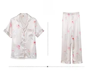 Detail view of floral print pajamas set featuring short sleeves and long pants