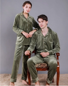 Detail of plush olive green velvet couple pajamas with waffle texture and buttons