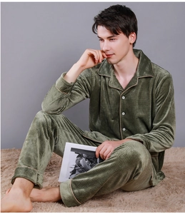 Detail of olive green waffle knit men's pajamas set with contrast pink piping