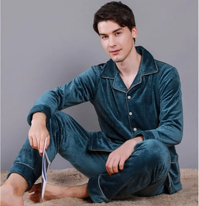 Close-up of men's velvet pajama set with waffle texture and contrasting piping