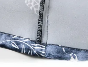 Detailed close-up showing neat stitching and fine seams on silk pajama inner fabric