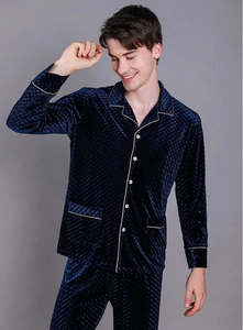 Detail of navy velvet pajama set with diamond quilting and elegant contrast piping