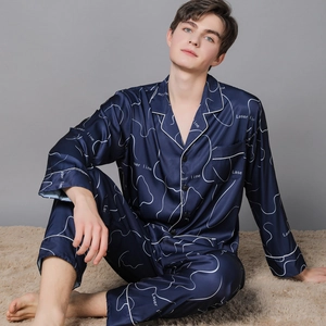 Men's navy blue silk satin pajama set with long sleeves and stylish printed pattern