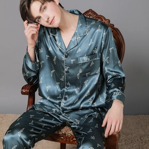 Men's silk satin pajama set in dark cyan with white crane print and button-up lapel