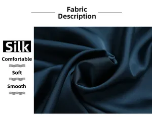 Detail of luxurious dark blue silk fabric showing smooth texture and soft sheen